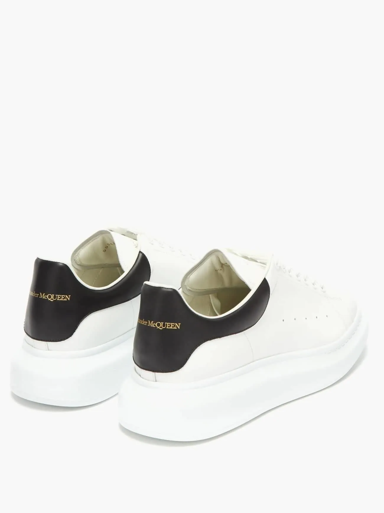 ALEXANDER MCQUEEN  Oversized low top leather sneaker white/black